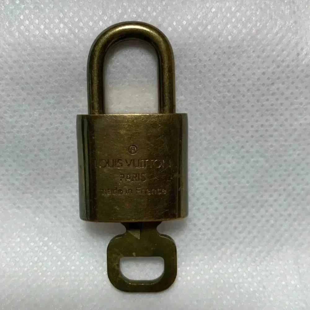 LOUIS VUITTON Lock & Key.  Key no: 307